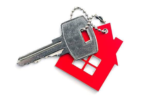 istock House shaped key chain isolated on white background 464540593