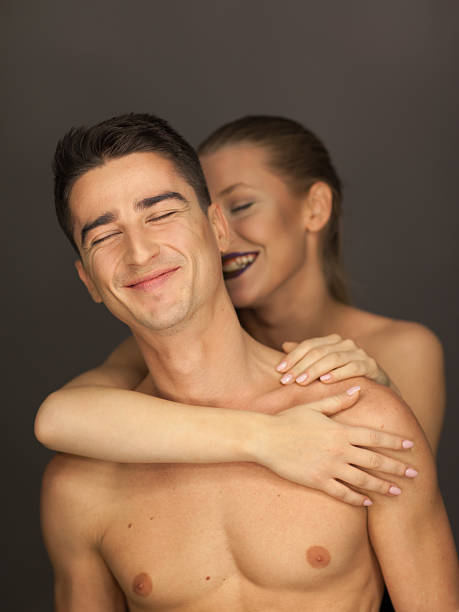 istock beautiful couple in studio portrait 464540675