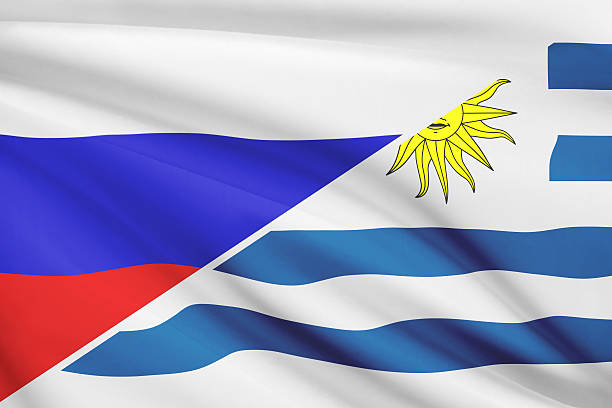 gerüschter flags. russland und orientalische republik uruguay. - oriental republic of uraguay stock-fotos und bilder