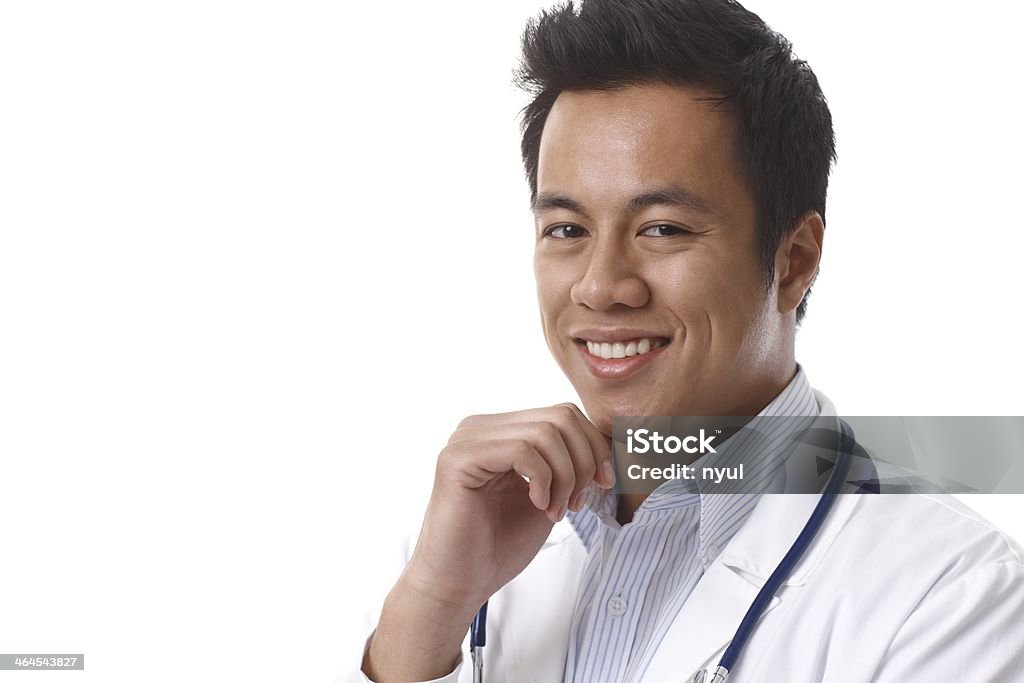 Closeup portrait of handsome doctor Closeup portrait of handsome young Asian doctor smiling, looking at camera.. 20-29 Years Stock Photo