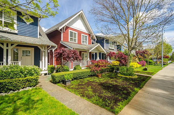 Perfect Neighbourhood A perfect neighbourhood. Houses in suburb at Spring in the north America. detached house stock pictures, royalty-free photos & images