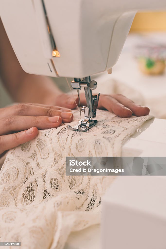 Quick needle Close-up of sewing machine working with net lace 2015 Stock Photo