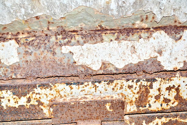 istock crumbling rusty metal sheet iron brown, close up 464552996
