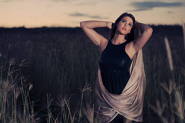 istock Woman in a field in the later afternoon. 464559622