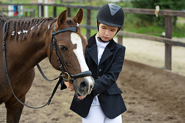istock girl with a horse 464559863