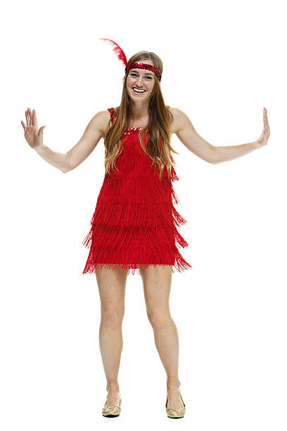istock Smiling woman dancing with flapper dress 464560977