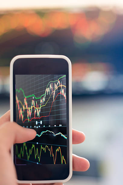 istock Smart Phone with Stock market graph 464563310
