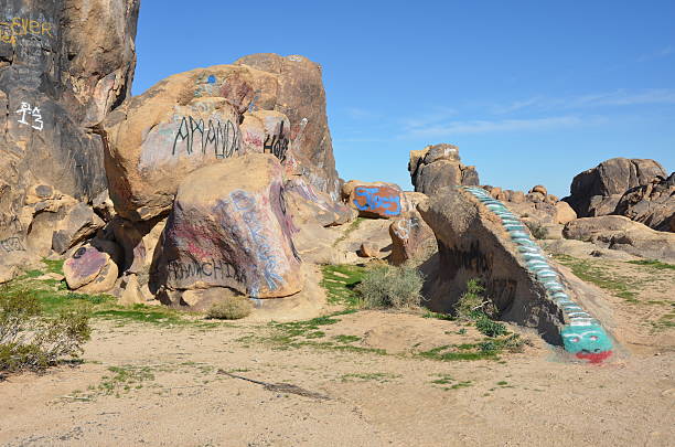 istock Graffiti Covered Boulders in California Desert 464563658