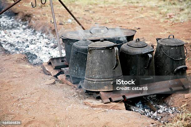 https://media.istockphoto.com/id/464564834/photo/outdoor-fire-pit-with-coffee-pots-and-cast-iron-cauldron.jpg?s=612x612&w=is&k=20&c=ogGa9SyB4g2akuPjnIKxKl55uxID1Cj6DFe8oDYq6X8=