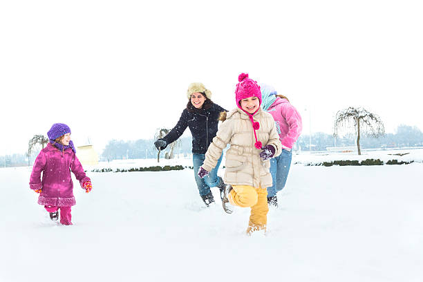 istock Happy family enjoying in winter 464566041