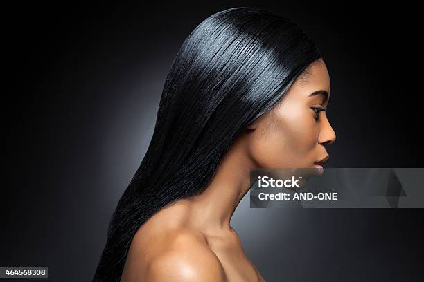 Profile Of An Young Black Beauty With Long Straight Hair Stock Photo - Download Image Now