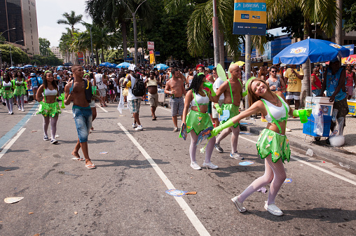 Rio de Janeiro, Brazil - February 14, 2015: Thousands of revelers in costumes take over the streets of the city center in Rio's largest carnival street bands. Black Ball (Bola Preta).