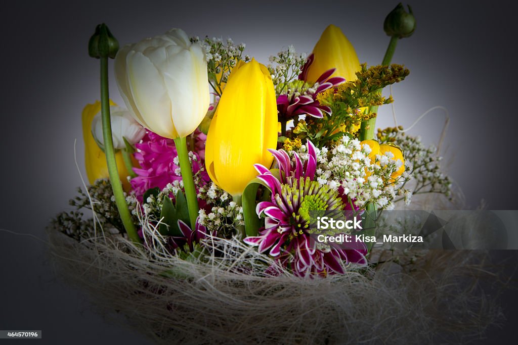 bouquet of flowers Lightened Colorful bouquet of different type spring flowers  2015 Stock Photo