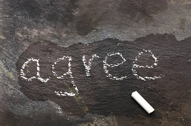 istock The word agree written with chalk on black stone. 464570318