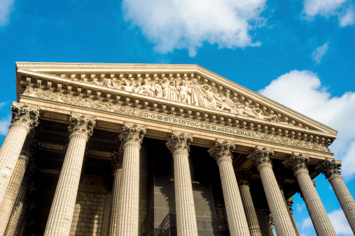 The Madeleine is built in the Neo-Classical style during the rule of  and was inspired by the Maison Carrée at Nîmes, one of the best-preserved of all Roman temples.