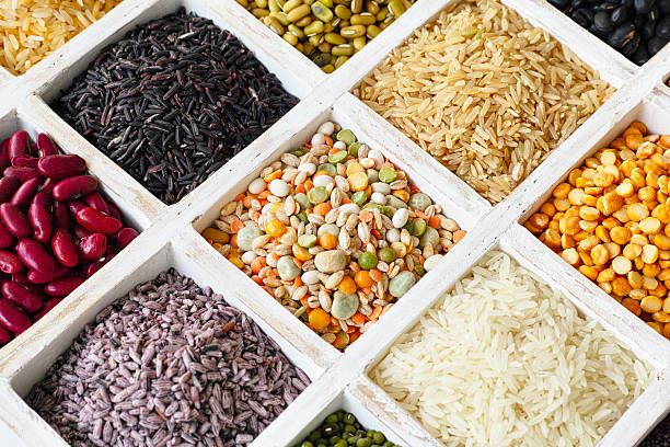 istock Various grains, beans, pulses, nuts and seeds in a tray. 464570452