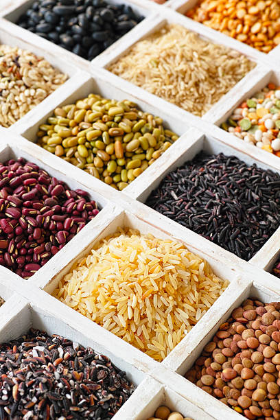 istock Various grains, beans, pulses, nuts and seeds in a tray. 464570454