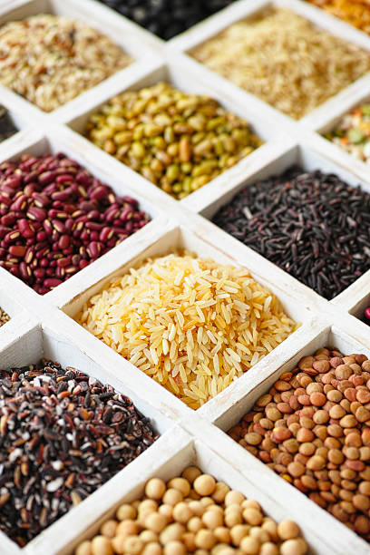 istock Various grains, beans, pulses, nuts and seeds in a tray. 464570456