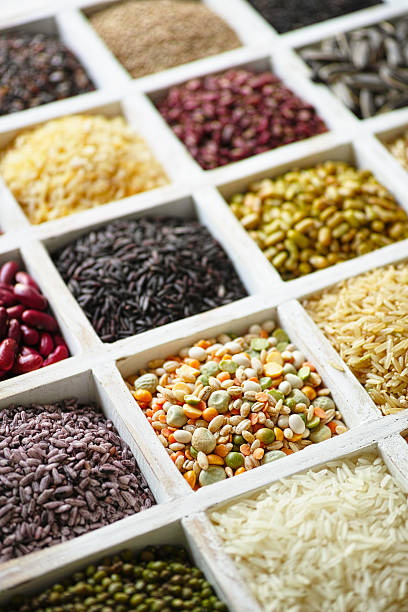 istock Various grains, beans, pulses, nuts and seeds in a tray. 464570458