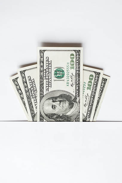 cem dólares - one hundred dollar bill dollar stack paper currency - fotografias e filmes do acervo