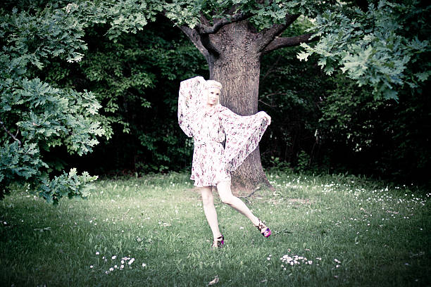 istock Beautiful woman in the forest 464572459
