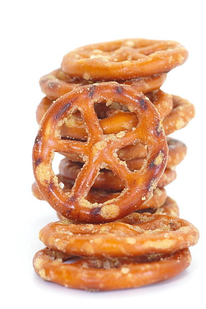 istock Baked bread pretzel snack on white background 464573758