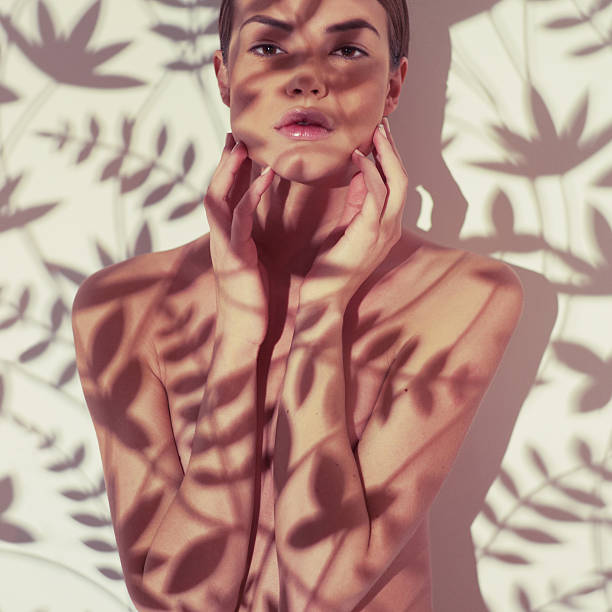 Beautiful lady with floral pattern on body stock photo