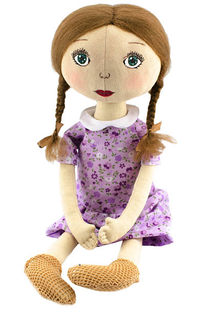 istock Rag doll girl dressed in pink 464573994