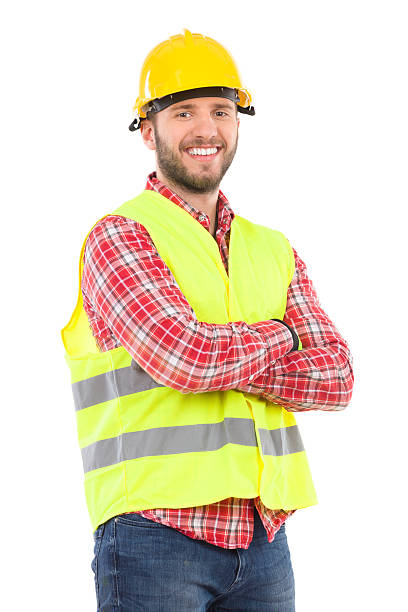 istock Man in reflective vest and hardhat 464574188