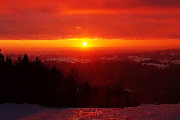sunset in ski resort stock photo