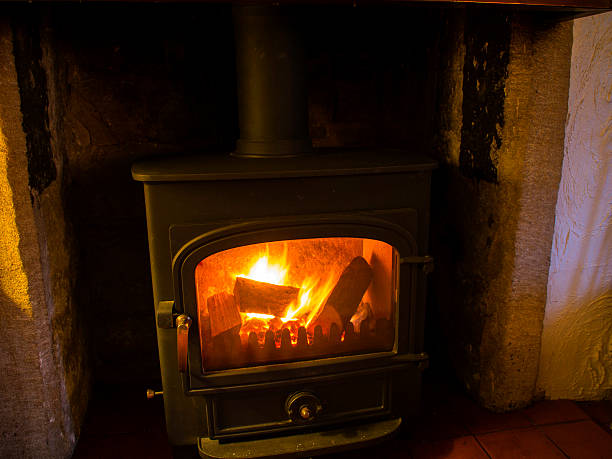istock coal and wood fire stove 464576666