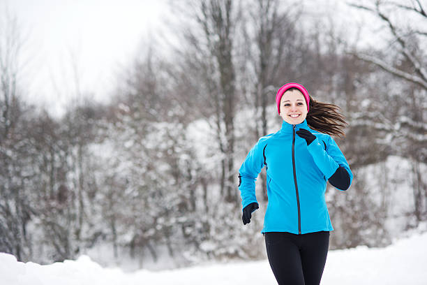 istock Winter running woman 464577767
