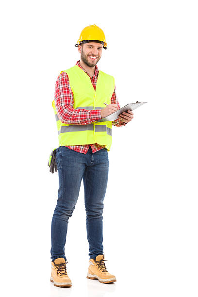 foreman tomar uma aplicação notes (notas) - manual worker full length isolated on white standing imagens e fotografias de stock