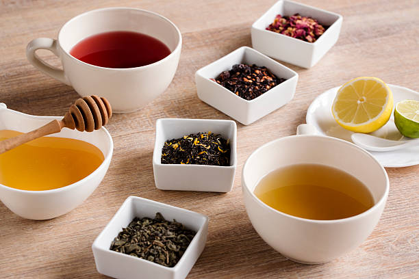 istock cup of green and rose  tea 464582354