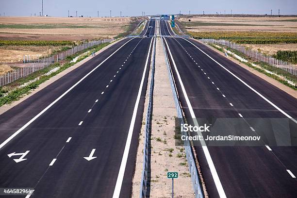 New Highway In Eastern Europe Stock Photo - Download Image Now - 2015, Agricultural Field, Asphalt