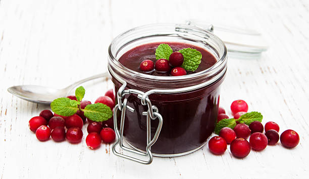 istock cranberry jam with fresh fruits 464583054