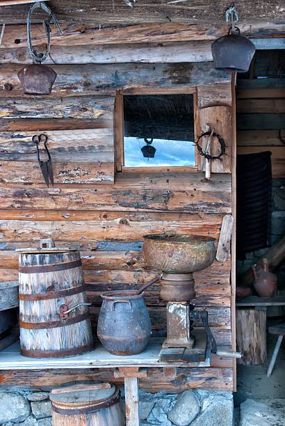 istock Old pottery, bells and wooden barel 464584317