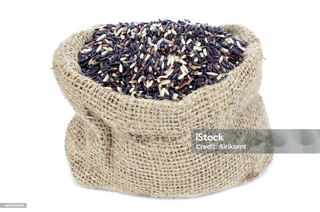 Preto pilha de arroz em Gunny bolsa - Foto de stock de Aniagem de Cânhamo royalty-free