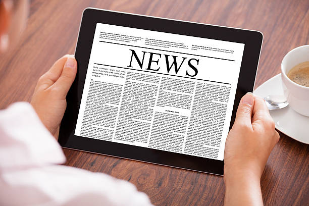 istock Woman Looking At News Article 464585691