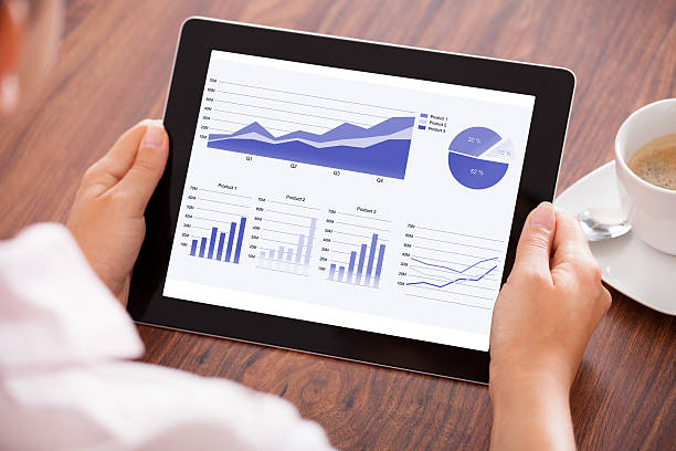 istock Woman Looking At Digital Tablet 464585735