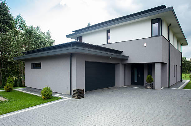 Driveway paking Contemporary driveway parking of the big modern house empty home garage stock pictures, royalty-free photos & images