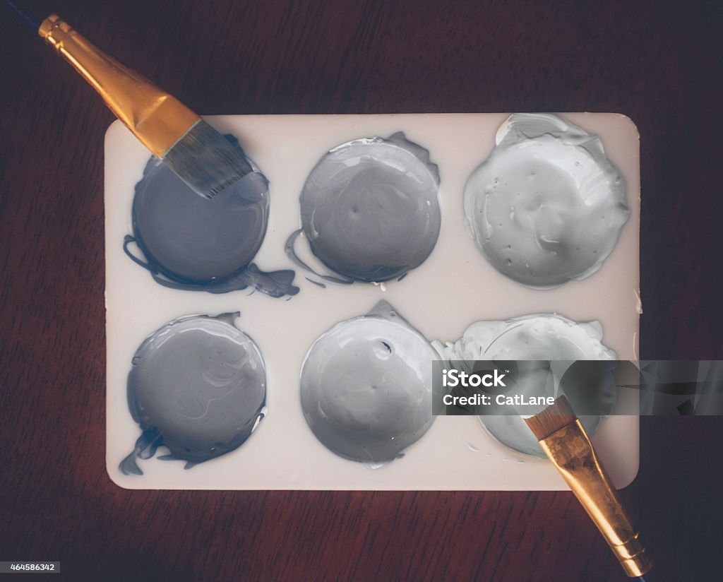 Paint palette with paint colors in various shades of gray Gray Color Stock Photo