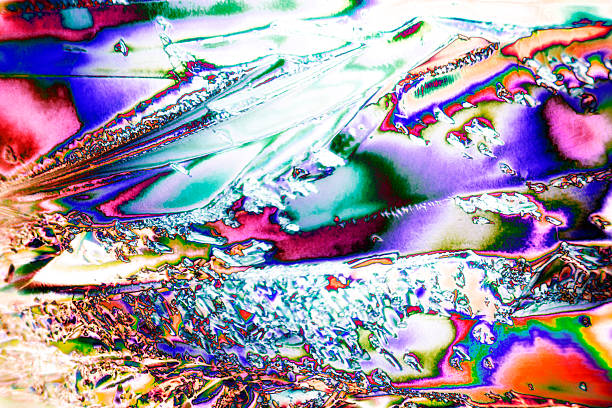 istock Microcrystals of tartaric acid in polarized light 464586768