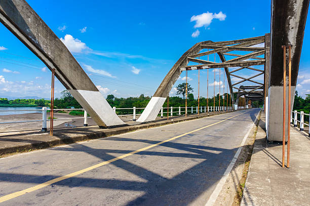 istock Historical bridge over the river with shade 464593698