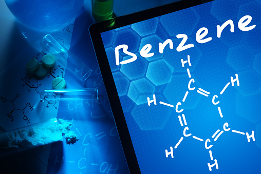 Tablet with the chemical formula of benzene. Test tubes, tablets and chemical formulas.