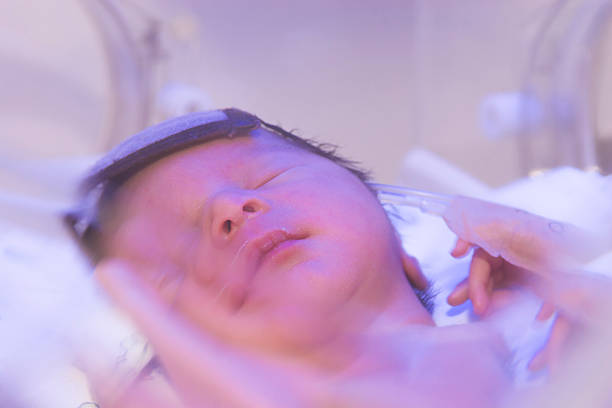 istock Newborn baby inside incubator 464597690