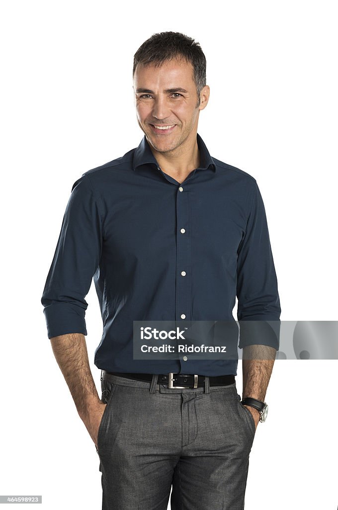 Happy smiling middle age businessman with hands in pockets Portrait Of Happy Businessman Looking At Camera Isolated On Withe Background Cut Out Stock Photo
