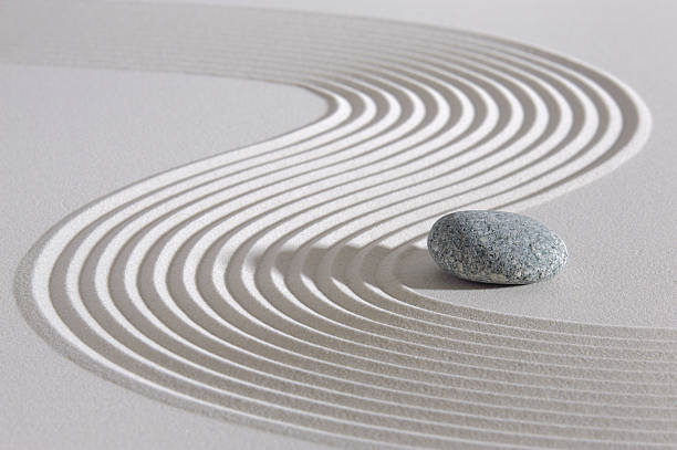 Japanese ZEN garden Japan garden with stone of meditation in raked sand japanese garden stock pictures, royalty-free photos & images