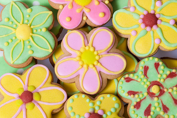 Easter traditional Gingerbread cookies Vintage Easter flower traditional Gingerbread cookies background icing stock pictures, royalty-free photos & images
