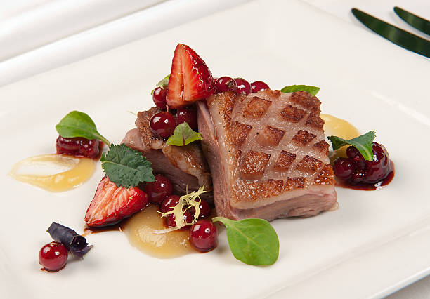 istock duck breast with seasonal berries 464602032